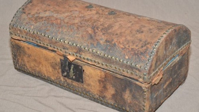 Small, leather coated 18th century travelling case, pictured after conservation, A la Ronde, Devon.